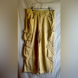 RAGGED PRIEST Wide leg, low rise tan cargo pant.